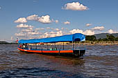 A long boat sail the Mekong river in the Golde Triangle area, Northern Thailand.